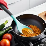 최고의 실리콘 요리 도구 - A vibrant kitchen scene featuring a set of flexible, durable silicone kitchen tools including a spat...